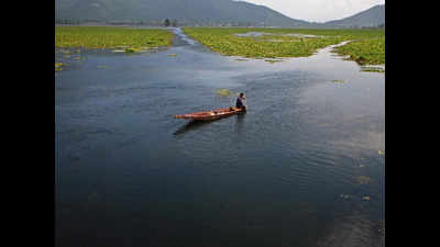 Mining boat with barge swept near Kakrapar reservoir