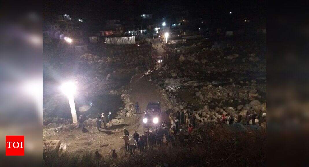 Well Collapses Well collapse buries two men, rescued after 5 hours
