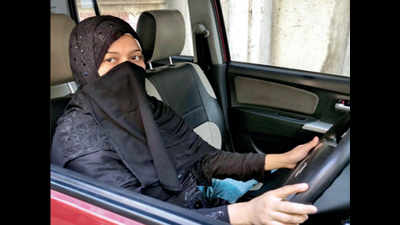 United colours of cabbies: Mom by day, burqa-clad driver by night