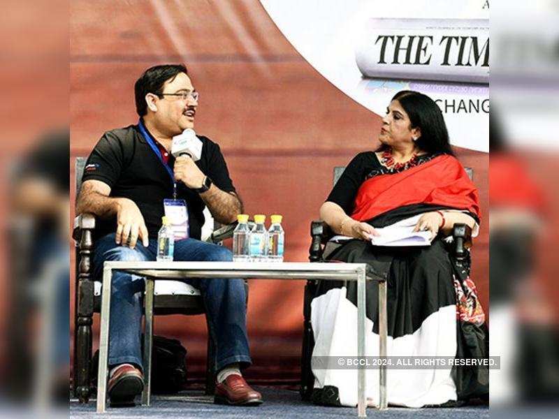 Author Ravi Subramanian speaks while Associate editor, Times of India and Write India, Director Vinita Dawra Nangia looks on during the Write India session on Day 1 of Times Litfest Delhi 2017, held at the India Habitat Centre, in New Delhi, on November 25, 2017.