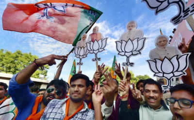 BJP retains Gujarat, ousts Congress from Himachal Pradesh