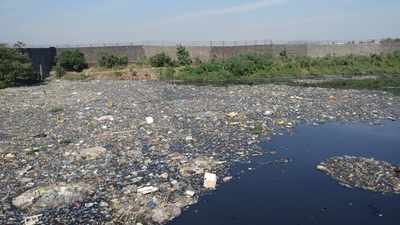 Thrash seen floating in the Mithi River