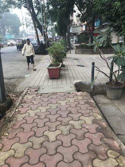 Society blocks Footpath - Times of India