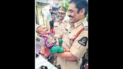 Hyderabad cop's pic of four-month old smiling at him emerges favourite for 'Police2017' defining image