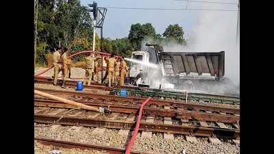 Torres charred near railway track after coming into contact with power lines