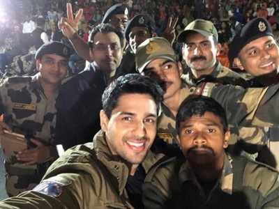 Watch: Sidharth Malhotra tries his hands at rope crossing as he trains with BSF jawans