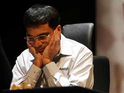 Anand draws with Wei Yi to stay in joint lead