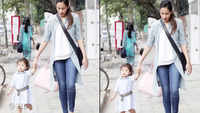 Baby Misha and mommy Mira Rajput go hand-in-hand for an evening stroll