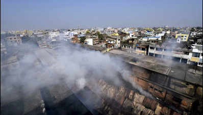 2 die as fire reduces civic market to ashes