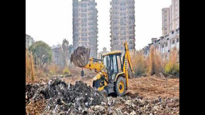 Zirakpur society residents clear a neighbourhood mountain of waste