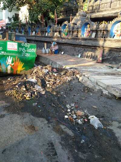 Trash next to temple - Times of India
