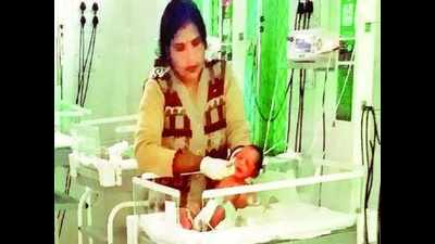 Infant boy, protected by stray dogs, found in trash bin of Rampur district hospital
