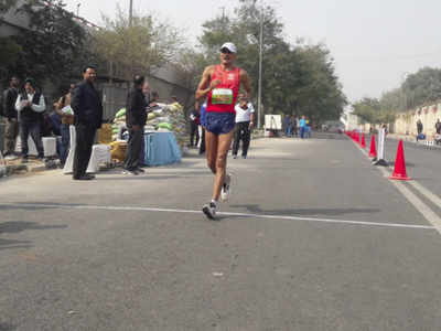 Sandeep Kumar retains men's 50km walk title