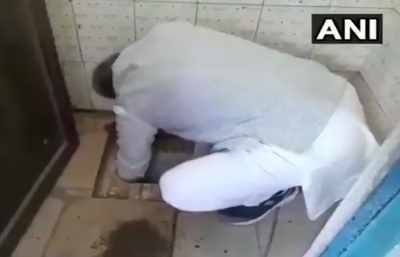 Watch: BJP MP cleans school toilet with bare hands