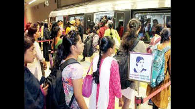 Women cheer, throng reserved Metro doors