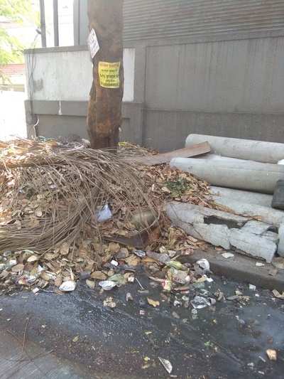 Garbage and pipes on footpath