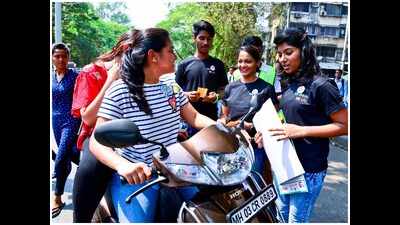 Students of Gurukul College raise awareness about two-wheeler safety