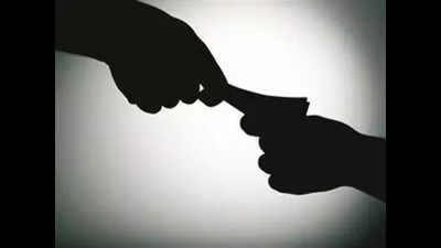 SBI assistant manager caught taking bribe from farmer
