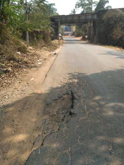 new mangalore airport road in worst condition - Times of India