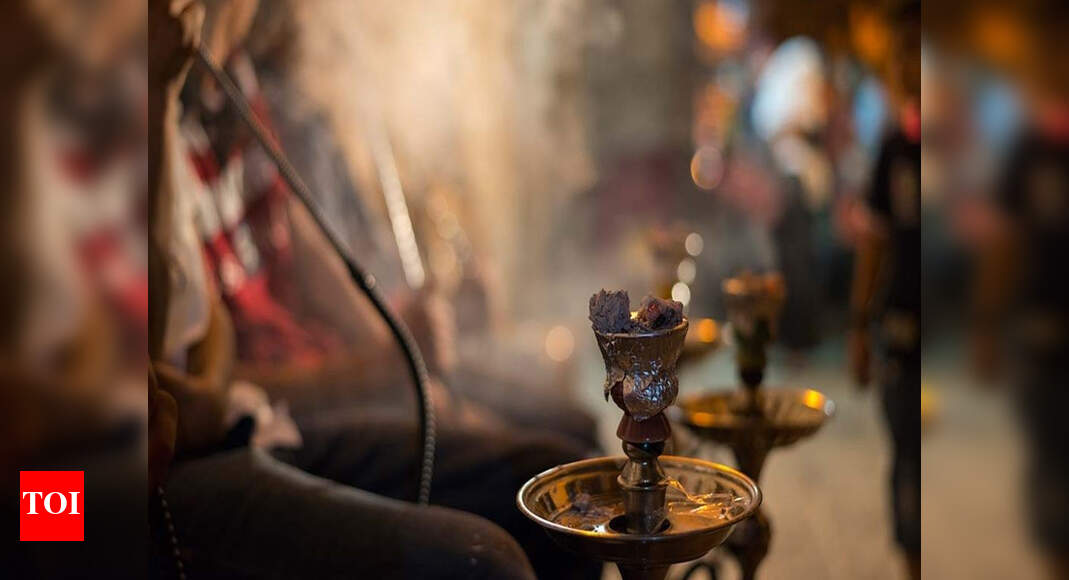 HOOKAH PARLOUR Nagpur Municipal action against illegal rooftop hookah