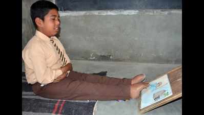 Meet Kamaljeet. He writes with his foot, tops class