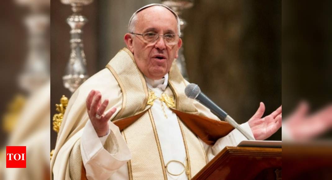 Author suspended for criticizing Pope Francis as a 'dictator' - Times India