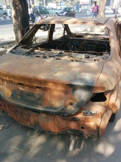 Trashed car - Times of India