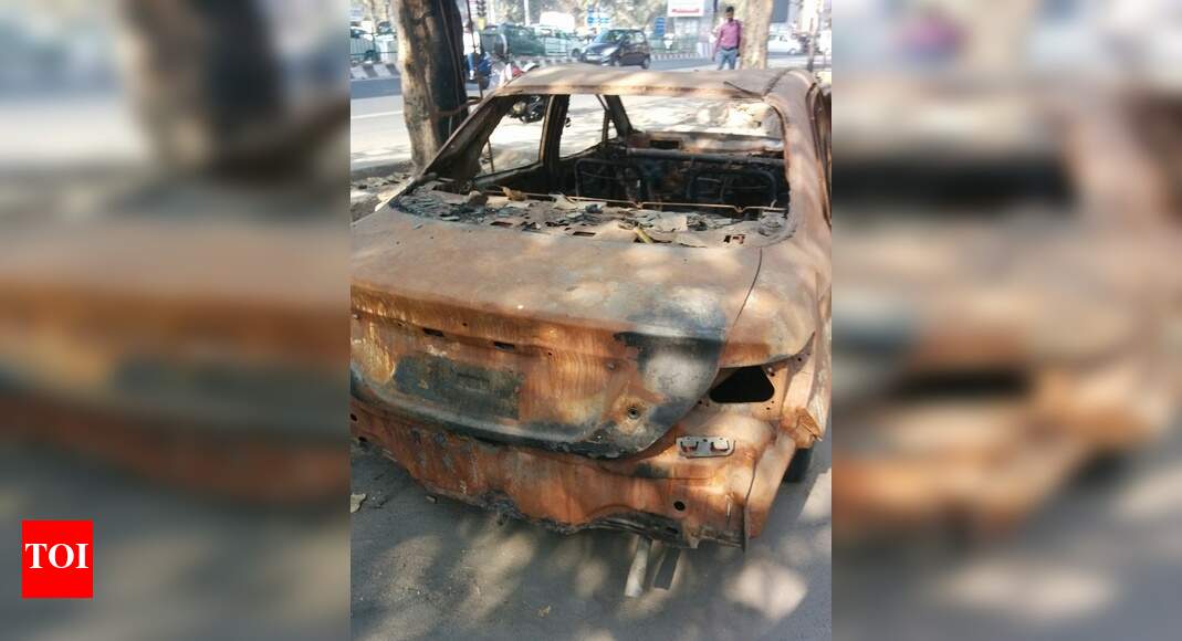 Trashed car - Times of India