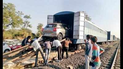 First train loaded with cars leaves Gujarat
