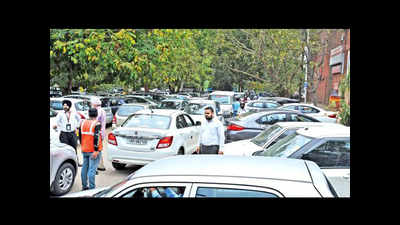 People jostle for space in Sector 8 parking lot
