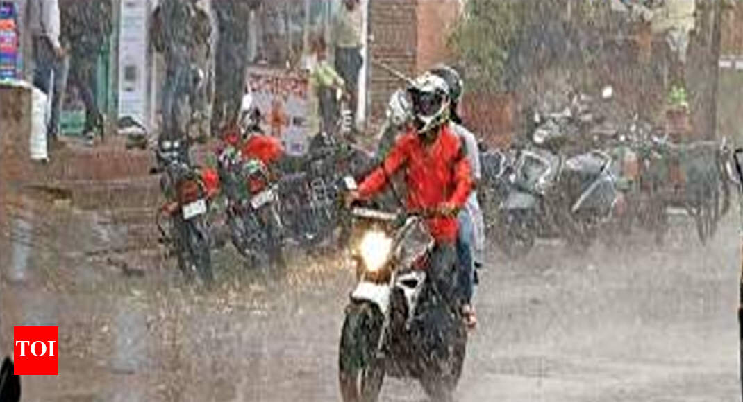 air india express Rain, dust storm bring down temperature in Jaipur