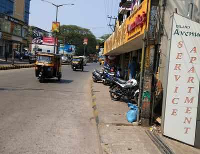 two wheelers parked on MG Footpath