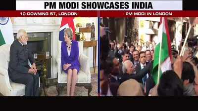 PM Modi greets Indian diaspora in London, meets Theresa May