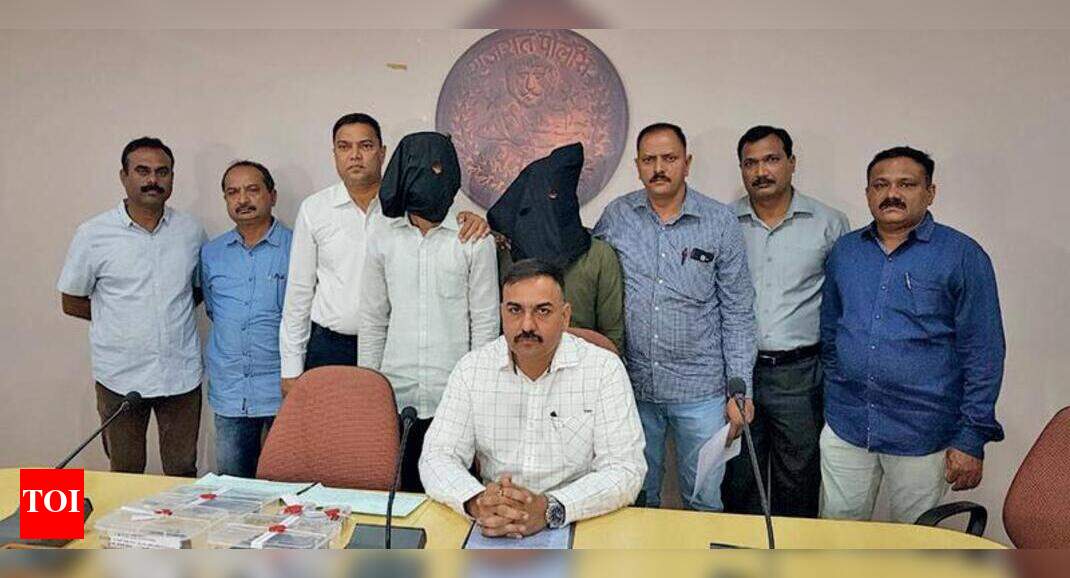 Two arrested for firing at builder | Vadodara News - Times of India