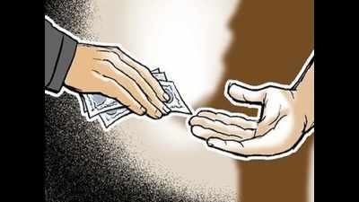 Surat civic body officer caught accepting bribe