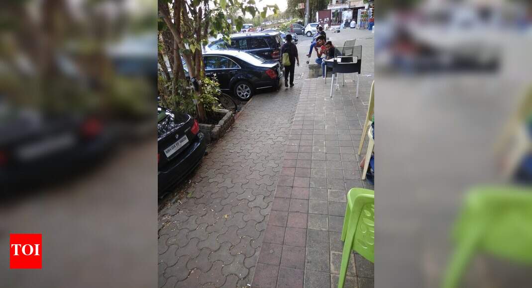 Footpath Encroached by Cars - Times of India