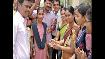 II PU Results: Beating odds, labourer’s daughter bags top spot