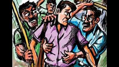 Eight booked for beating up three persons; one held