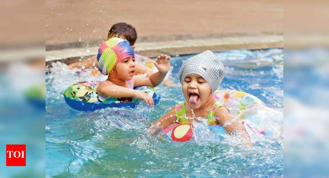 Toddlers as young as one taking swimming classes in Noida! Noida News