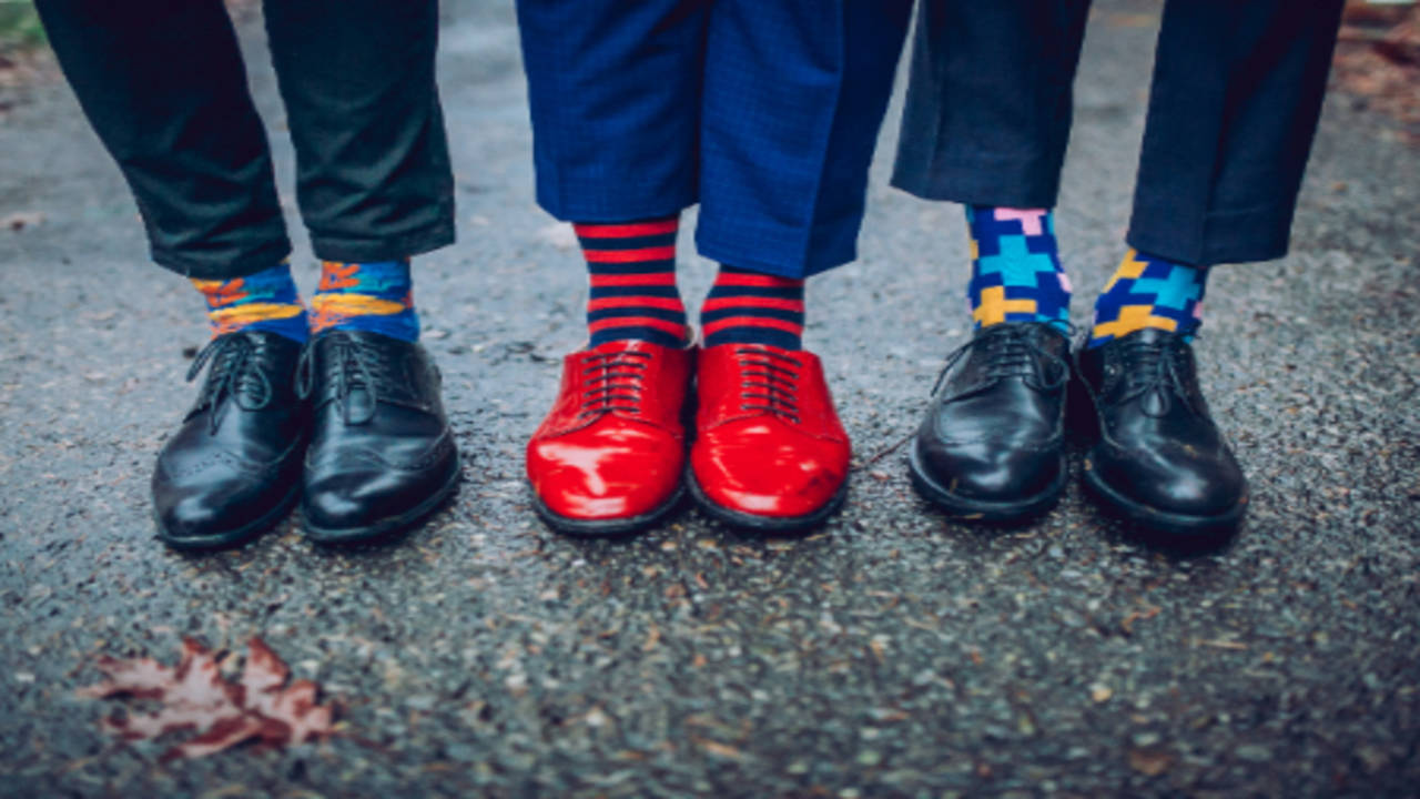 Woman Wearing High Heels with Socks Standing Close to a Man in Black  Trousers and Shoes · Free Stock Photo