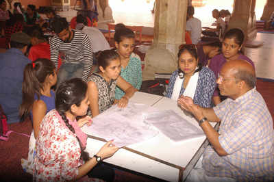 Children being trained in the art of miniature painting