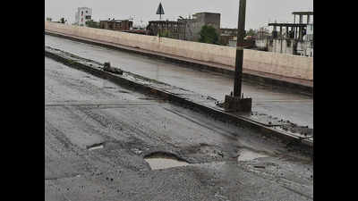 Calangute roads give way to potholes