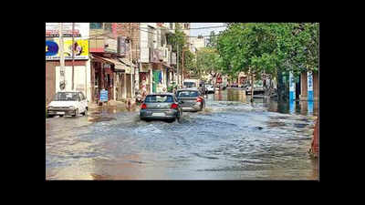 Overflowing sewage water raises a stink, streets flooded