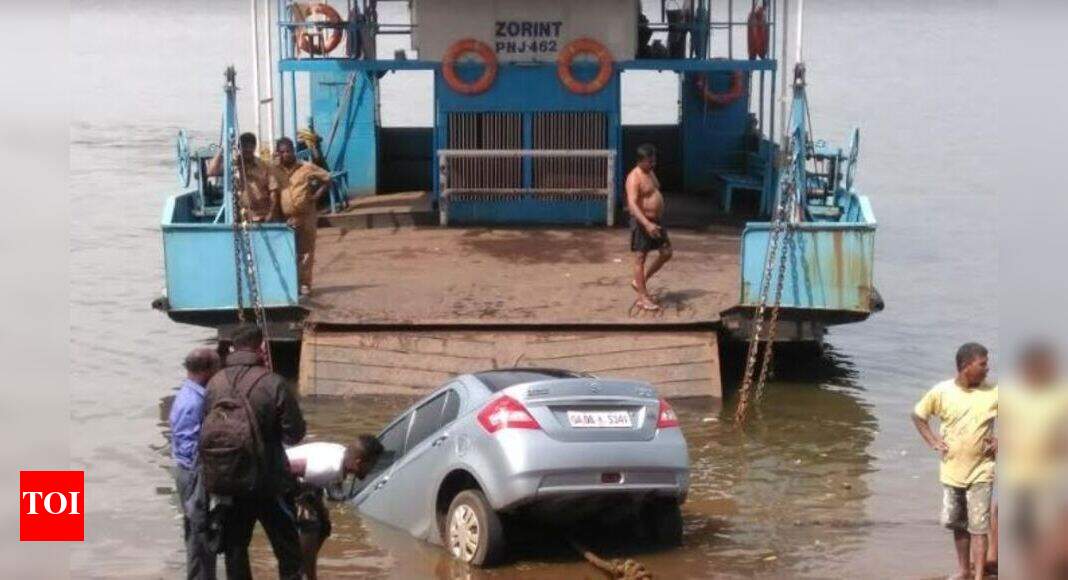 Car slips into river while getting onto ferry Goa News Times of India