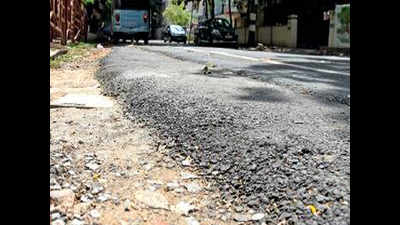 Roads laid without milling, locals stop work