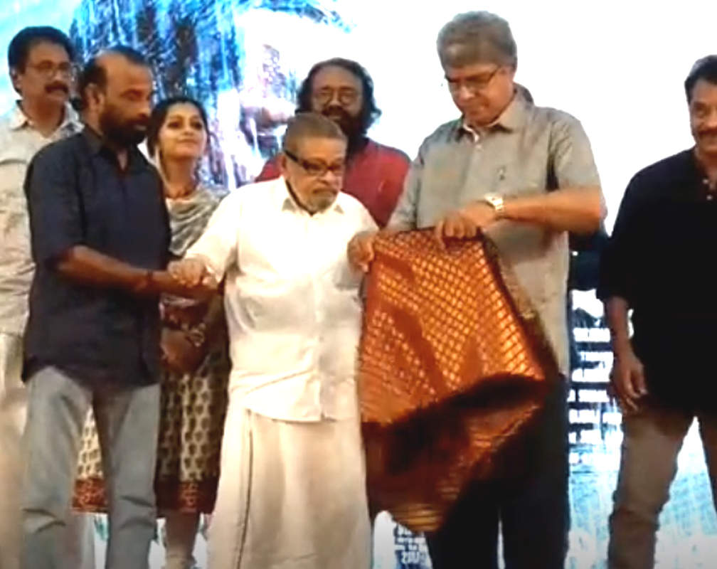 
Jayaraj's Bhyanakam team felicitates veteran music composer Arjunan Master
