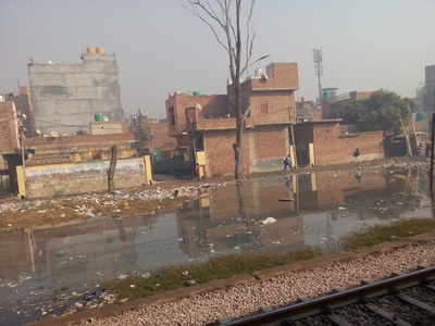 Garbage & stagnant water along tracks