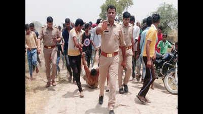 Hapur lynching: Photo shows cops guarding mob dragging body of lynched man