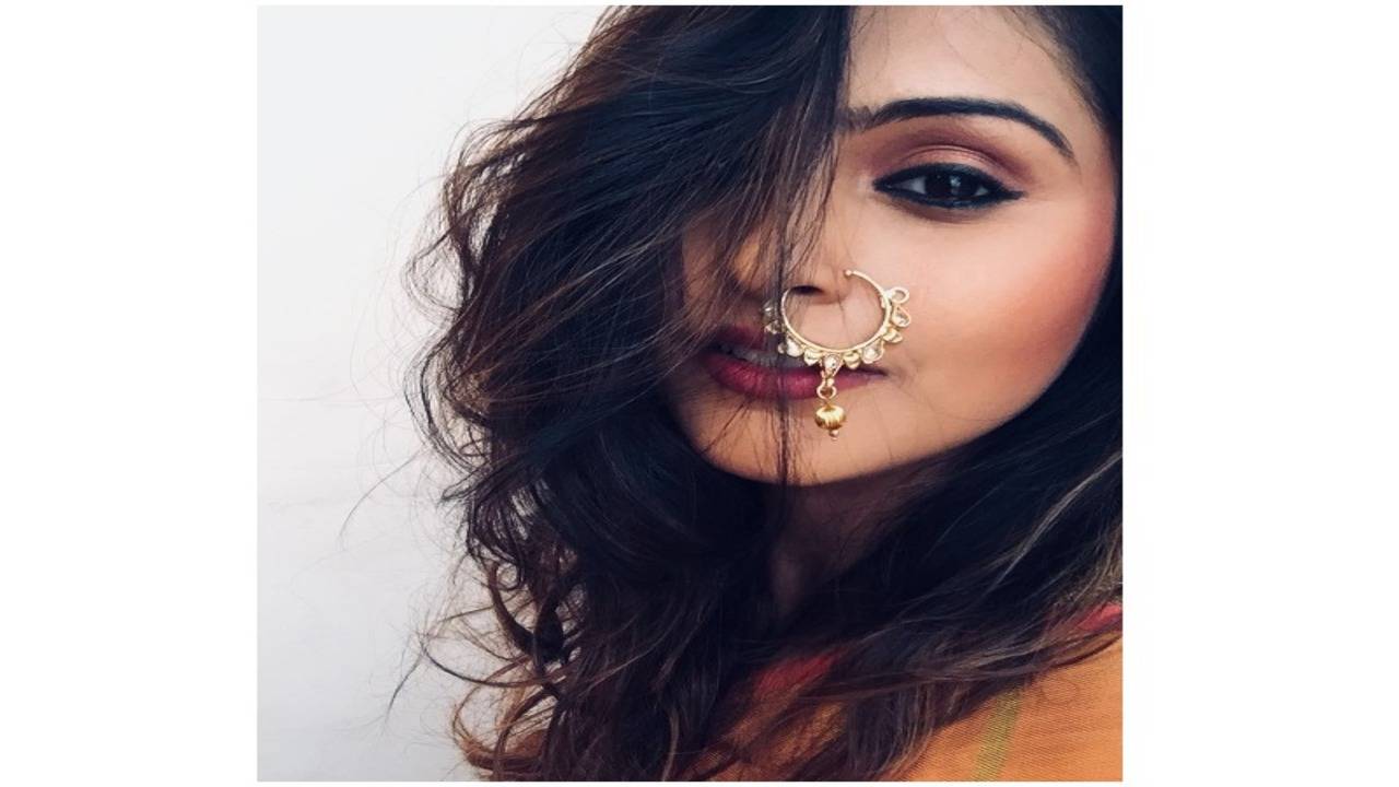 Close-up of Indian woman with nose ring Stock Photo - Alamy