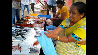 Shops wrap meat and fish in plastic hidden under paper